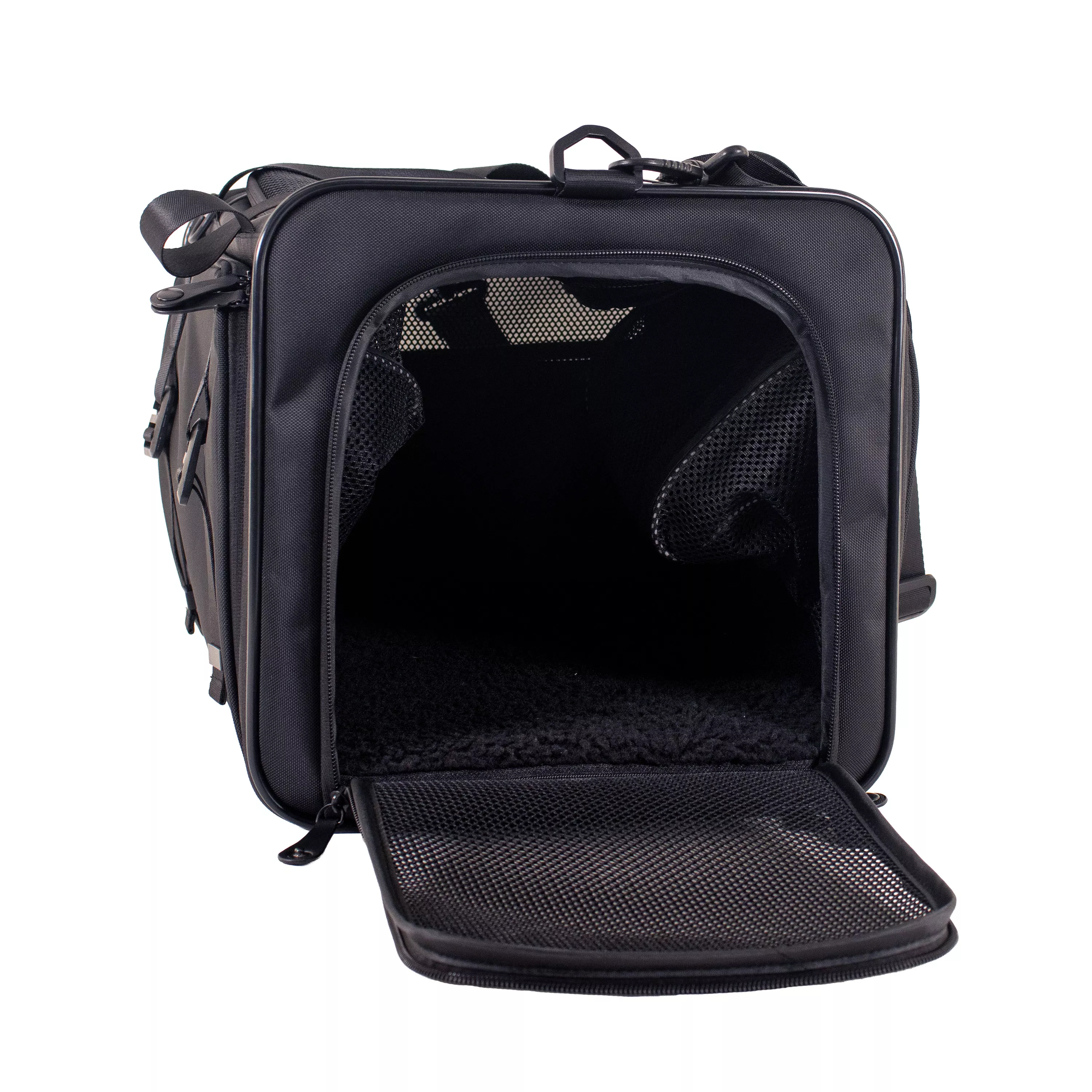 Angled view looking into the front opening of the tote with the mesh door unzipped and one expandable side fully open.
