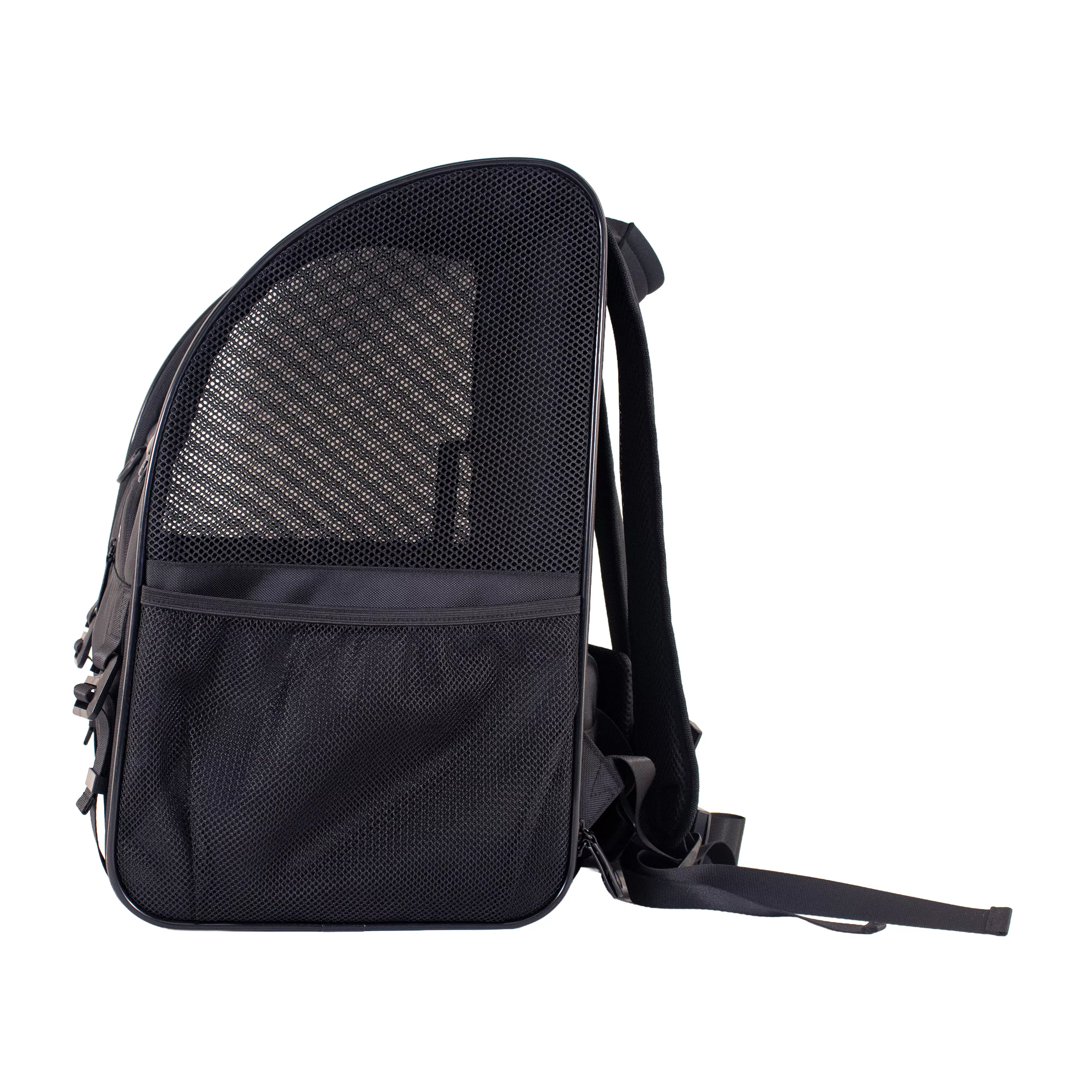 Angled side view of the pet carrier showing the open front doorway, mesh side panels, and shoulder straps extending behind it.