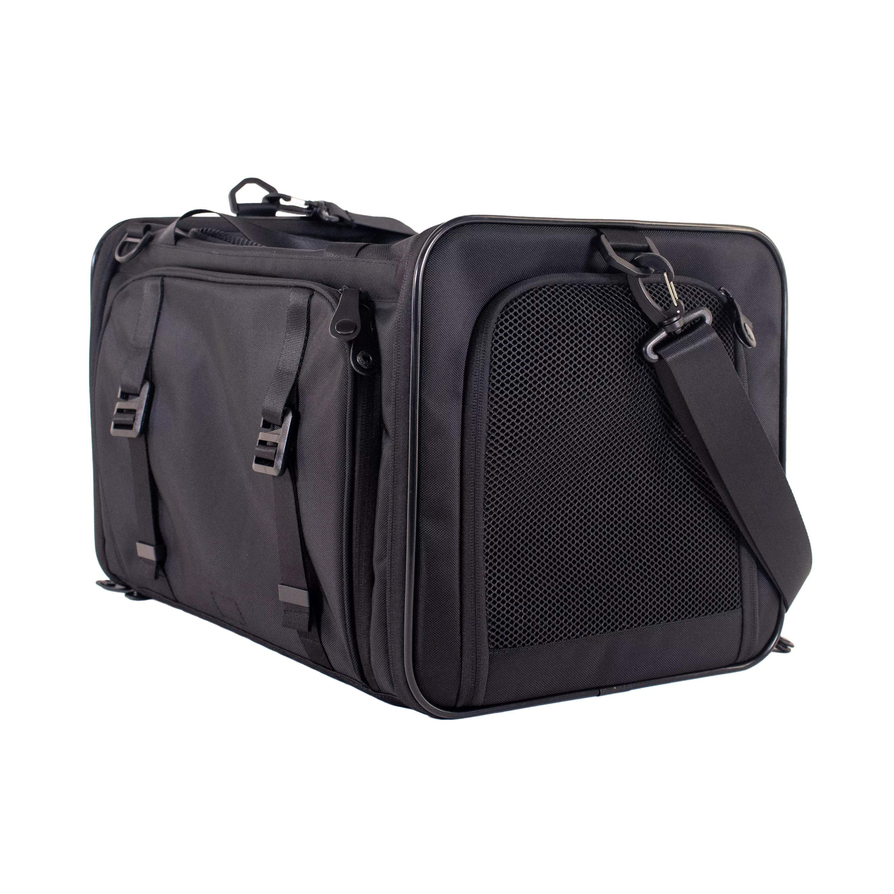 Angled side‑front view of the tote with the padded shoulder strap resting at the top and expansion zippers visible.