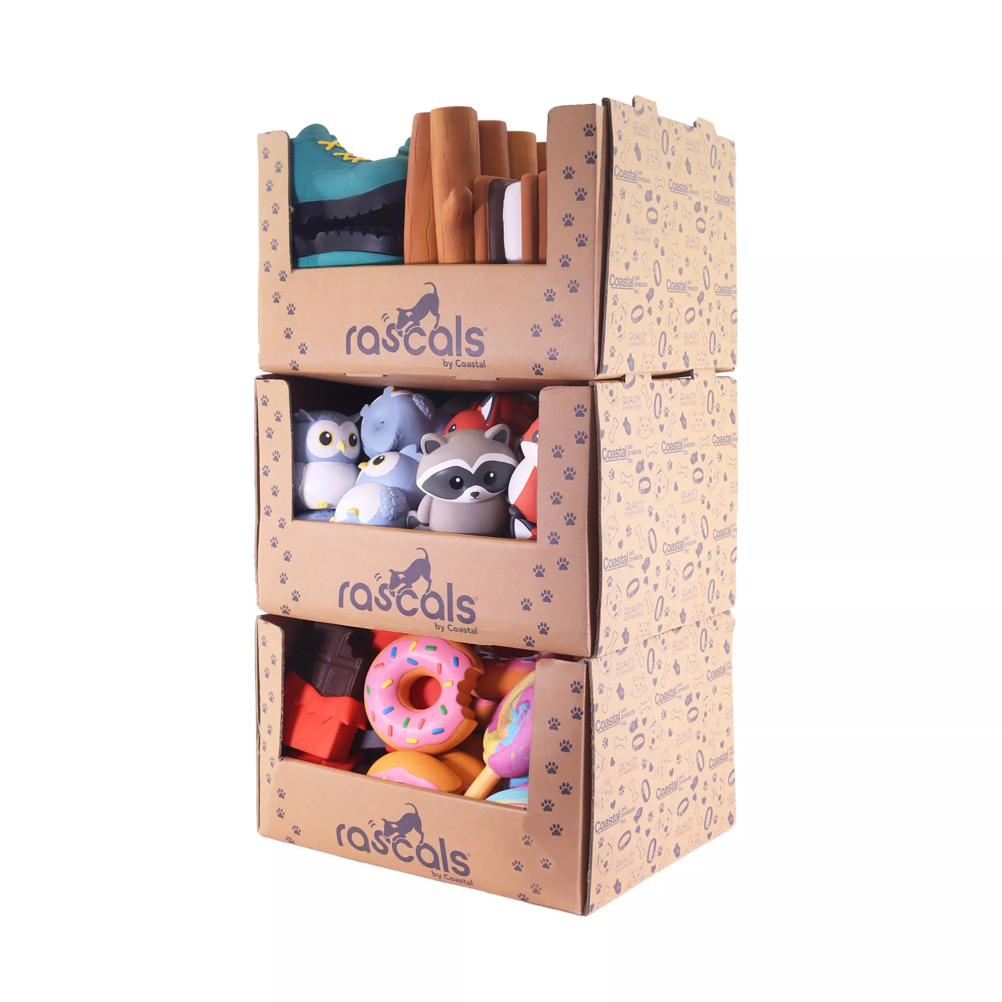 Three stacked cardboard crates filled with colorful latex dog toys