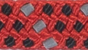 Woven pattern with red, black, and gray strands in a tight weave.