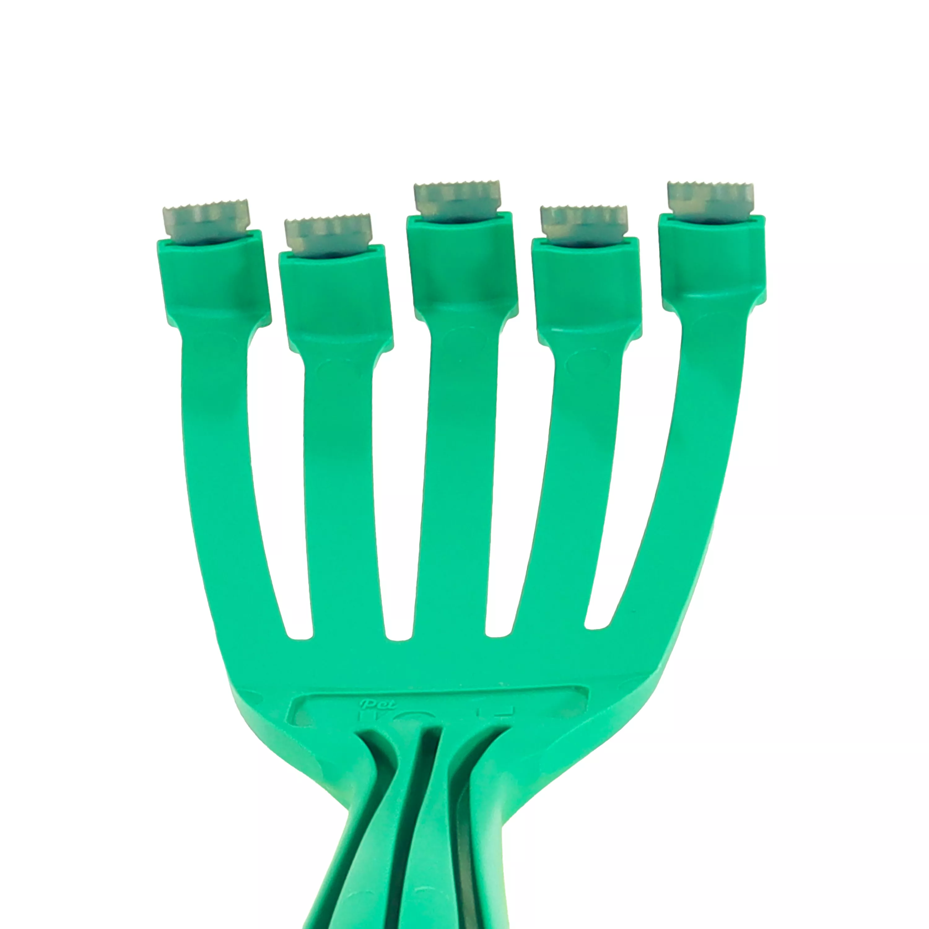 PetKORE GroomRaker for cats displayed on a white background. The grooming tool is green with a contoured ergonomic handle and five evenly spaced metal raking blades designed for removing loose fur and undercoat.