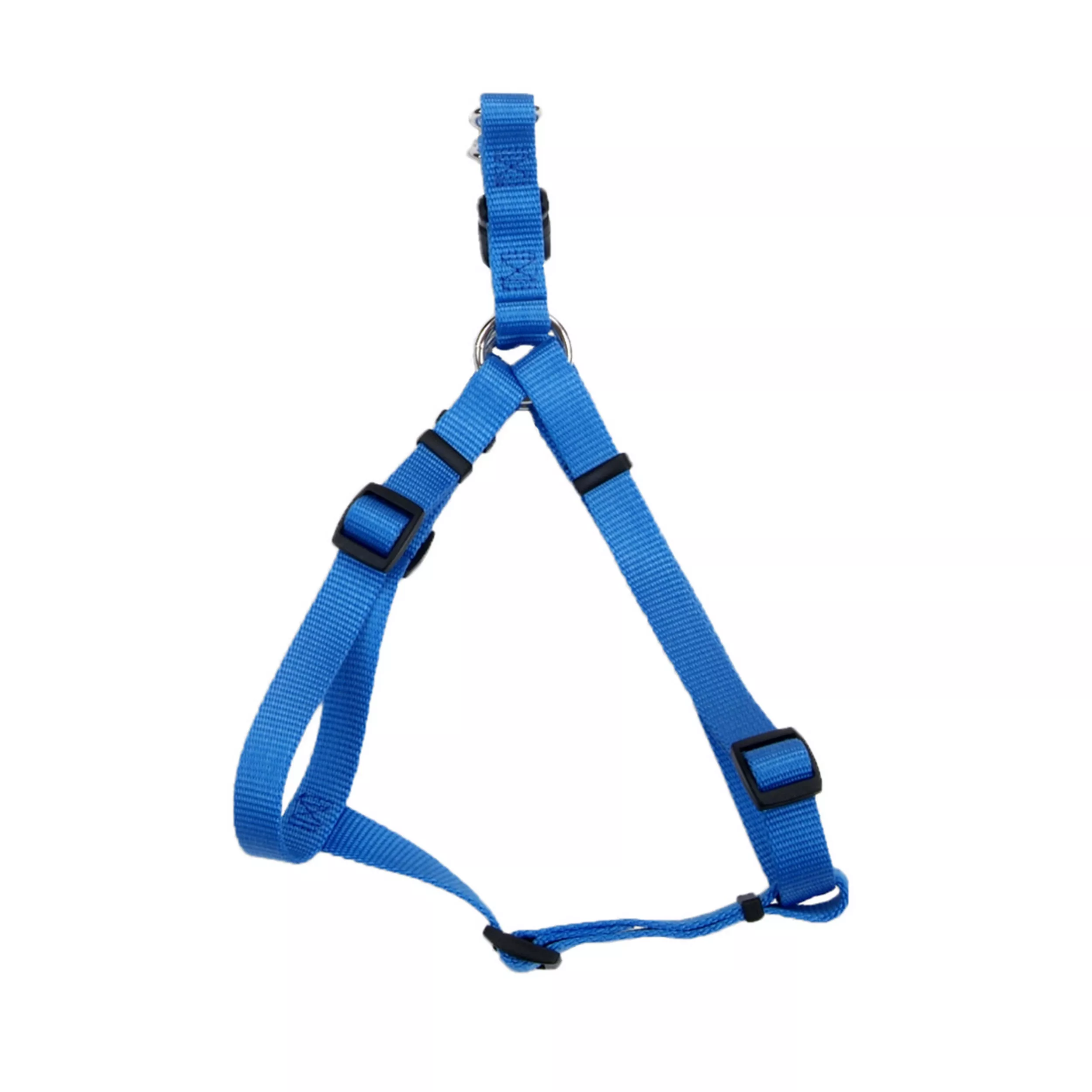A product‑only image of a light blue adjustable dog harness displayed against a white background. The harness is made of single‑ply woven nylon with a ribbed texture. It features black plastic adjustment sliders, a black plastic buckle, and silver‑tone metal D‑rings joining the strap segments. The harness is positioned upright, showing the arrangement of the neck, chest, and girth straps.