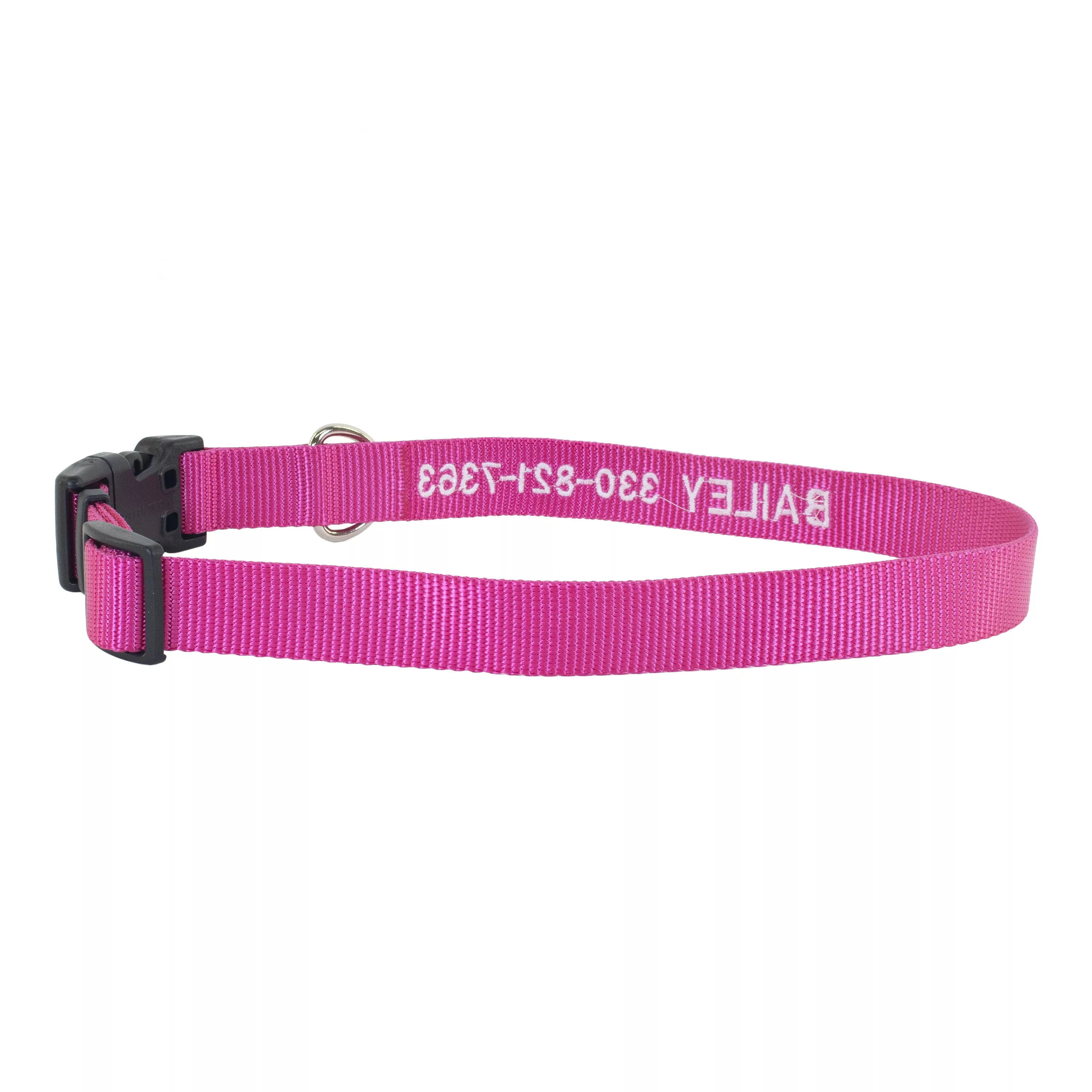 Pink personalized nylon dog collar with white embroidered text showing a pet name and phone number, featuring an adjustable strap, side-release buckle, and metal D-ring.
