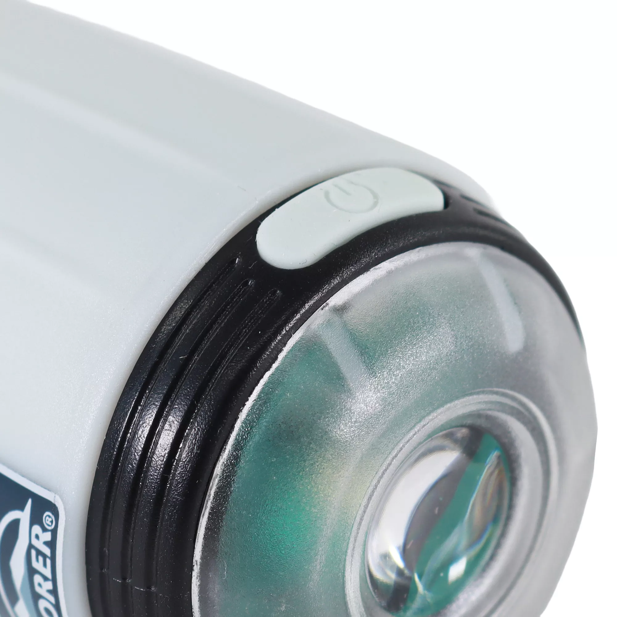 A white cylindrical waste bag dispenser is shown close up on a white background. The dispenser has a clear front lens covering a built‑in light. A small gray power button is visible.