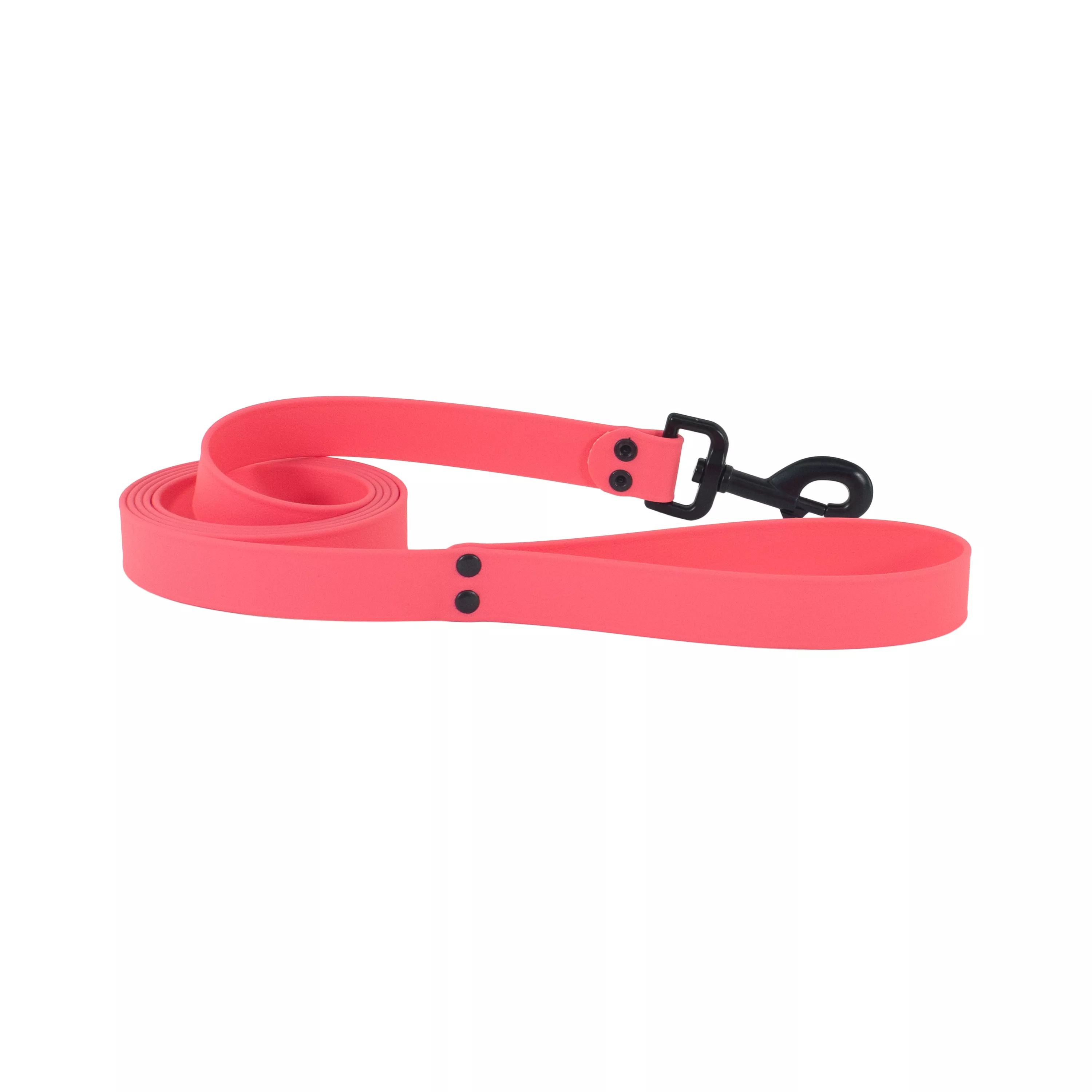 Coral BioThane waterproof leash coiled in a larger roll with the black metal swivel snap positioned toward the front.