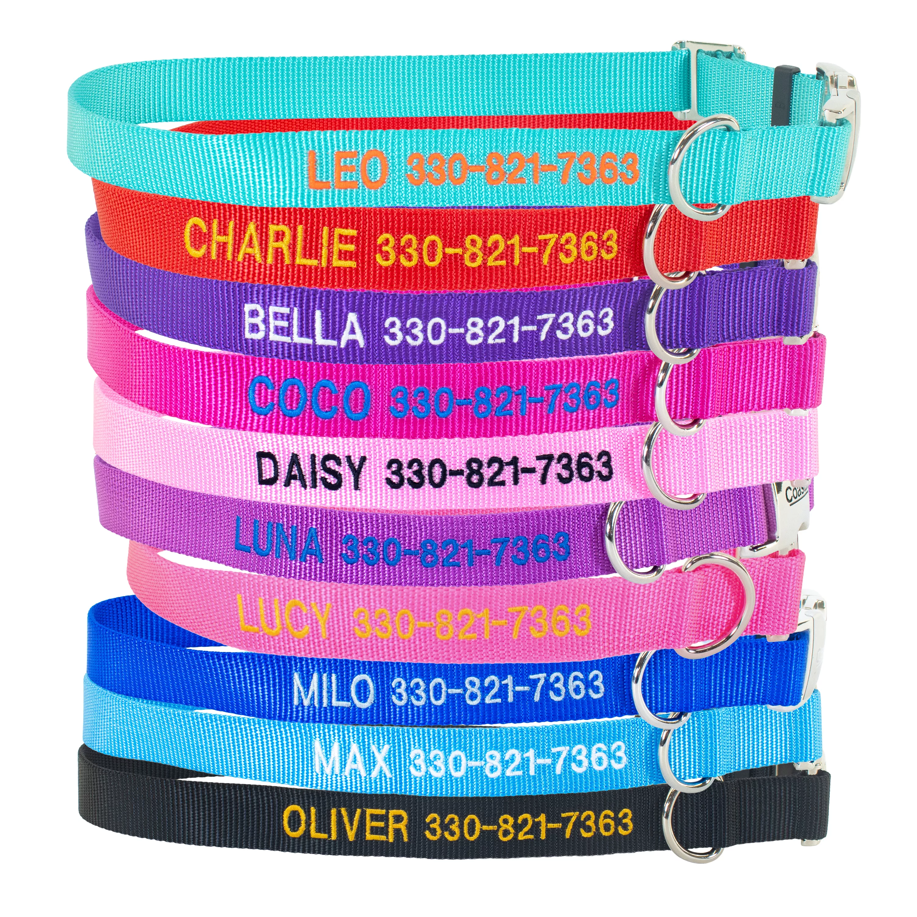 Stack of personalized nylon dog collars in assorted colors, each embroidered with a pet name and phone number, featuring metal D-rings and buckles.